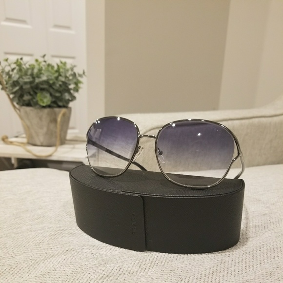 Prada Accessories - Almost new Prada sunglasses